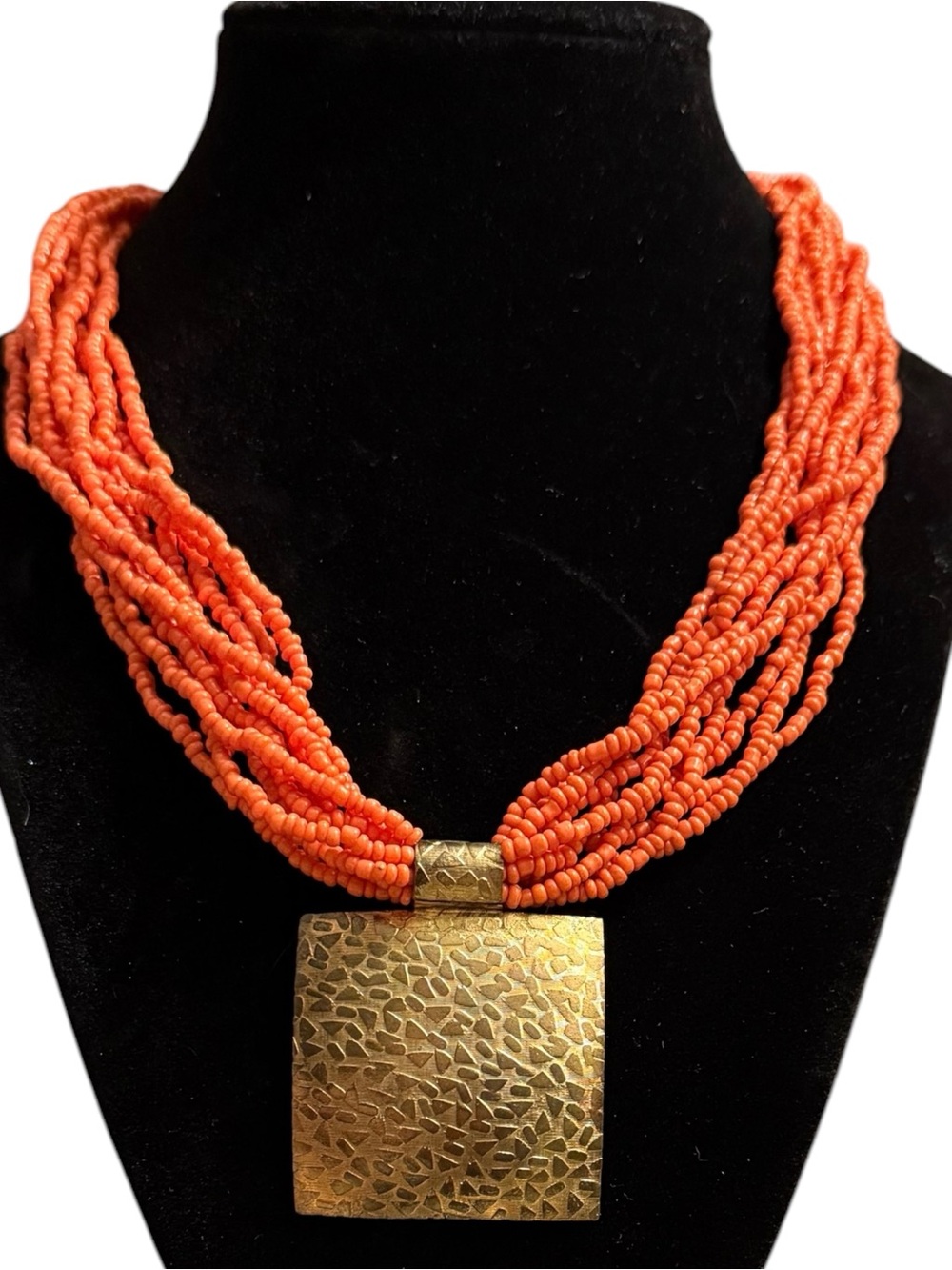 Handcrafted Orange Multi-Strand Beaded Necklace with Textured Gold Pendant